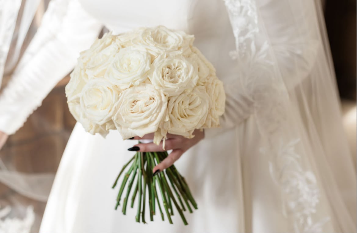 A classic white rose bridal bouquet